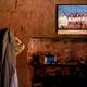 A picture of Sakharam Bhagat, with his wives, Tuki, Sakhri and Bhaagi (L to R) is seen on a wall inside their house